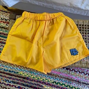 Prada nylon shorts in yellow